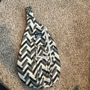 Gray, black-and-white sling bag